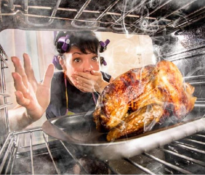 woman looking at turkey